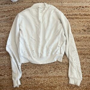 Cotton Citizen cropped white “destroyed” look sweatshirt